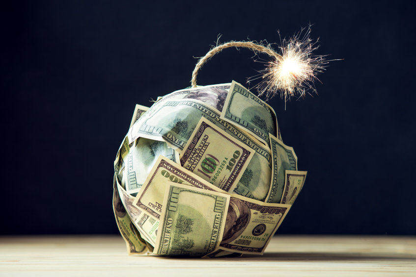 Picture of a ball of cash with a burning wick